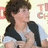 Pixelated image of a person with curly brown hair wearing a black vest over white shirt, next to bright pink background with blue text reading "I RATHER LISTEN TO THE JONAS BROTHERS THE LISTEN YOU AND YOUR PROBLEMS!! I LOVE NICK JONAS".