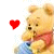 A 2x2 contact sheet of Winnie the Pooh animated frames with heart symbols changing color across three visible frames.
