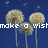Pixelated image of three dandelion seed heads on green stems against a dark blue background with white text reading 'make a wish' across the bottom.