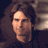 Pixelated static image of a person's face with long hair, visible in profile view against dark background.