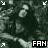 Pixelated dark green and gray abstract background with four white corner markers and a black rectangle containing 'FAN' text in the bottom right.
