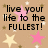 Pixelated image with black text reading 'live your life to the fullest!' on a beige background with pink and yellow stars.