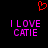 Red pixelated heart above two identical purple text blocks reading 'I LOVE CATIE' on black background.