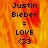 Justin Bieber text with LOVE and <33 symbols on a fiery orange-yellow background, displayed in a with one gray