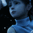 Pixelated blue-toned image of a person in profile view wearing a sleeveless top against dark background with scattered light specks.