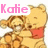 Two cartoon bears in red shirts hug; the left bear's head is slightly tilted while the right bear's head is upright.