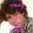 A four- of a person with curly brown hair wearing a gray and white checkered shirt, overlaid with pink pixelated text in each