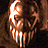 Two pixelated horror-themed faces with glowing teeth and horns on a dark red background, labeled "VOLUME 1" and "8/9" in white text.