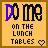 Four pixelated display "DO ME ON THE LUNCH TABLES" with a heart symbol, each showing different purple lettering and heart states