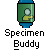 Green cylindrical container with blue top and bottom holds a figure with light gray head and yellow arm in a pointing pose, labeled "Specimen Buddy" below.
