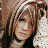 A 48x48 pixel buddy icon featuring a split composition with a person on the left and green text on a dark background on the right, displayed as part of an animated contact sheet.