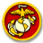 Circular icon with yellow border, red background, and central emblem featuring golden eagle, globe, and anchor symbols.