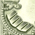 Pixelated grayscale icon of a boot with laces, viewed from the side against a light background.