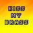 Pixelated text 'KISS MY BRASS' in dark brown block letters on a gradient yellow-orange background with visible pixelation.