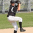 Pixelated image of a baseball player in mid-pitch pose with green background and orange text reading "Cubs Rule Sox Stink".