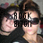 Two people in close proximity with overlaid pixelated text reading 'THE ROGK BITCH' on a blurred background.