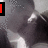 A grayscale image of a person's upper body with red text overlays changing between frames.