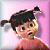Pixelated cartoon character with dark hair in pigtails, light skin, and a pink top against a gradient background.