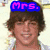 A pixelated image of a person with brown hair in a white shirt, featuring three distinct text overlays in different colors and positions across the frame.