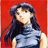 A pixelated anime-style character with long dark hair and blue eyes stands against a solid red background on the left, while the right side displays stylized text "Anime IM" above smaller text "COM" on a black background.