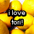 Pixelated yellow and orange background with black text reading 'i love tori!' in two lines.