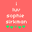 Pixelated text and symbols on a solid coral background with two identical static frames showing slight variations in green star-like icons.