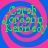 Four identical spiral patterns with alternating pink and blue rings, each containing green text reading "Capab Joradop I am say" in a pixelated font.