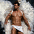 Pixelated image of a shirtless man with dark hair wearing white shorts, standing against a light background.