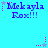 Pixelated text 'Mekayla Rox!!!' in blue with pink stars and dots on a cyan background, animated by star/dot movement.