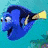 Blue fish with yellow tail and white stripe on side, orange clownfish with white stripes, and light brown sea creature with large black eyes in pixelated animation.
