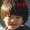 A child with brown hair and bangs appears in multiple with 'gogo' text in red, gold, and yellow above the head, wearing a dark top with a light background
