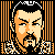 Pixelated 50x50 static icon of a historical figure with black hair, mustache, and beard against orange vertical bars on a black background.