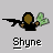 Pixel art icon of a figure with brown hair holding a green object, with a black shape extending left, and the name 'Shyne' below.