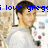 A pixelated image shows a person with short dark hair wearing a light-colored shirt, with blue text overlaid reading "i love gregg".