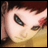Pixelated close-up of a character's face with visible eye, hair, and skin tones in warm color palette.