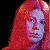 A pixelated image of a person with long brown hair wearing sunglasses and a dark top against a white background.