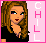 Pixelated image of a woman with long brown hair wearing a black top, standing against a pink background with vertical text.
