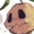 Pixelated cartoon pumpkin with brown and yellow coloring, dark eye sockets, a wavy mouth, green stem, and partial leaf visible on white background.
