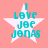 Four identical pixelated star-shaped icons with teal text "I LOVE JOE JONAS" on a pink background, arranged in a