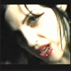 repeated close-up images showing a person with dark hair, red lips, and white face paint against black background