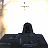 A pixelated image shows a dark, rounded object with a flat base against a bright background with a vertical light gradient on the left.