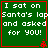 Green square with red border containing white text "I sat on Santa's lap and asked for YOU!" and a small red pixelated symbol at bottom-right corner.