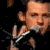 Animated contact sheet of a band member with multiple poses and text overlays on black background