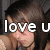 A pixelated image of a person with brown hair and sunglasses, overlaid with text reading 'love uNICOLE' and '1/2/08'.