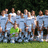 Pixelated group photo of people in blue uniforms with green grass background, red text overlays reading 'calverton united', ''94 is sexy!!', and '<3'.