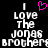 Pixelated text reads 'I Love The Jonas Brothers' with a pink heart symbol replacing the word 'love', displayed on black background.