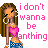 Pixelated doll with long brown hair, hoop earrings, pink top, and blue shorts, with changing text around her.