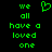 Green pixelated text on black background reads "we all have a loved one" with green heart symbol above the right side of the text.