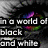 A pixelated eye with a rainbow-colored iris appears in grayscale surroundings, accompanied by text reading "in a world of black and white" on the left and "i see COLOR" on the right.