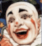 A clown face with exaggerated features in a of four and four , showing sequential facial expression changes